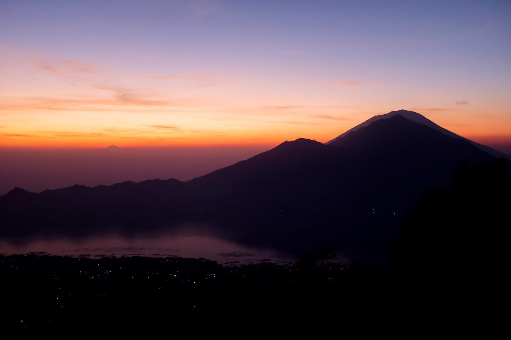 First light over Mount Agung and Mount Rinjani on Lombok.